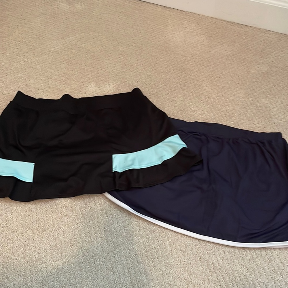 Tail and Boast Tennis skirts with built in shorts In good condition Size Small